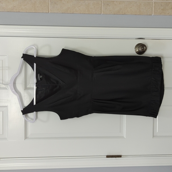 Bebe Mini Dress Size 8 Mini Pleated V-Neck banded hem Black - Picture 1 of 3